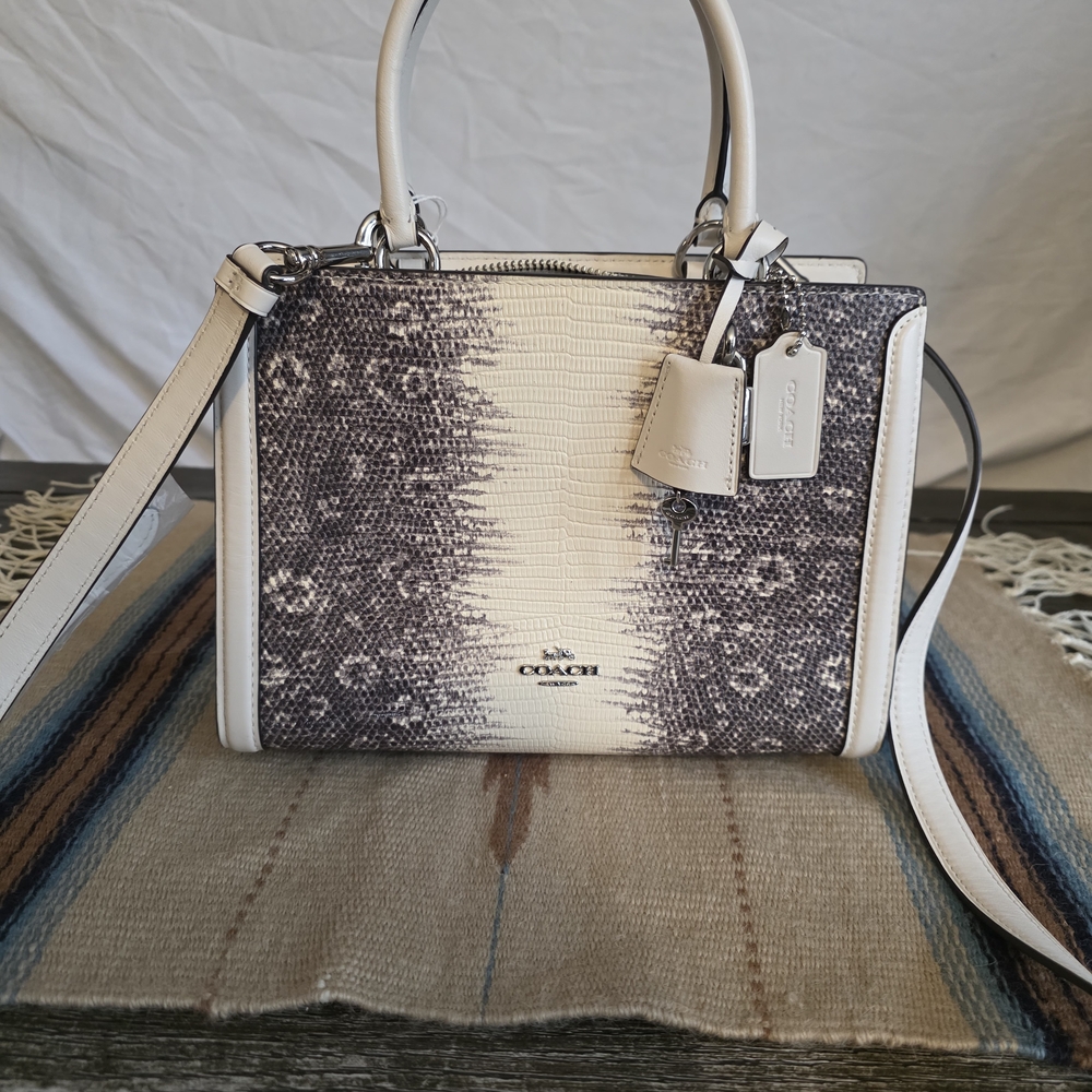 Coach Zoe Carryall in lizard-embossed leather, specifically in the Chalk/Silver